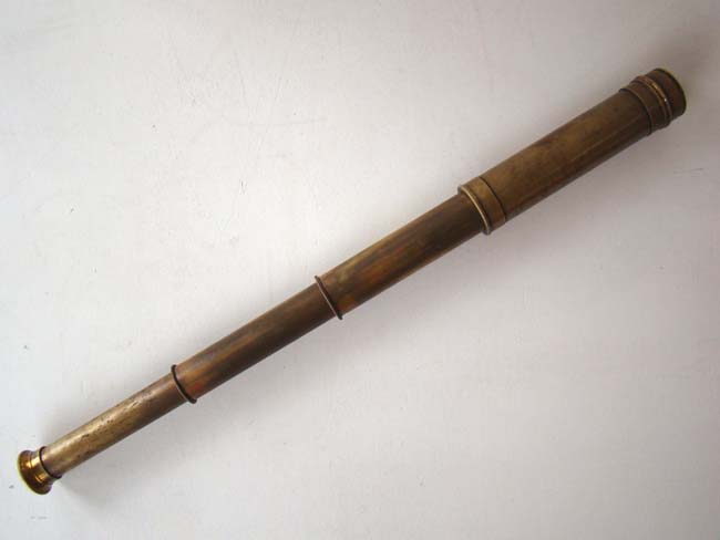 A small Civil War era three-draw brass pocket telescope circa 1860